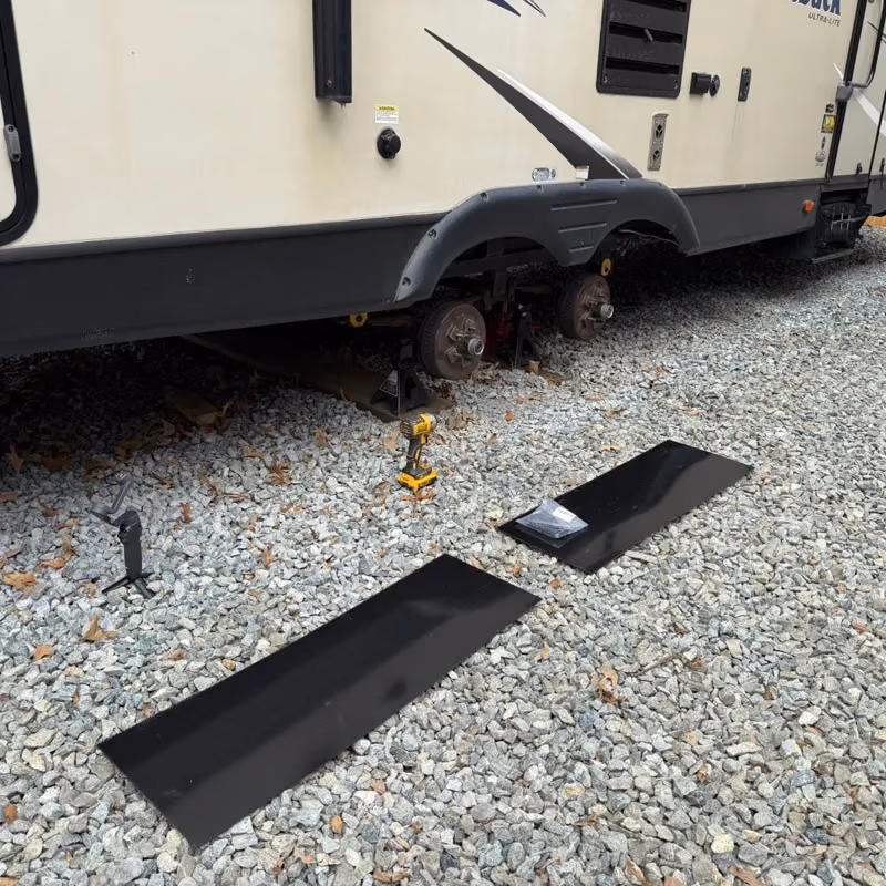 Titan Shield panels next to a travel trailer